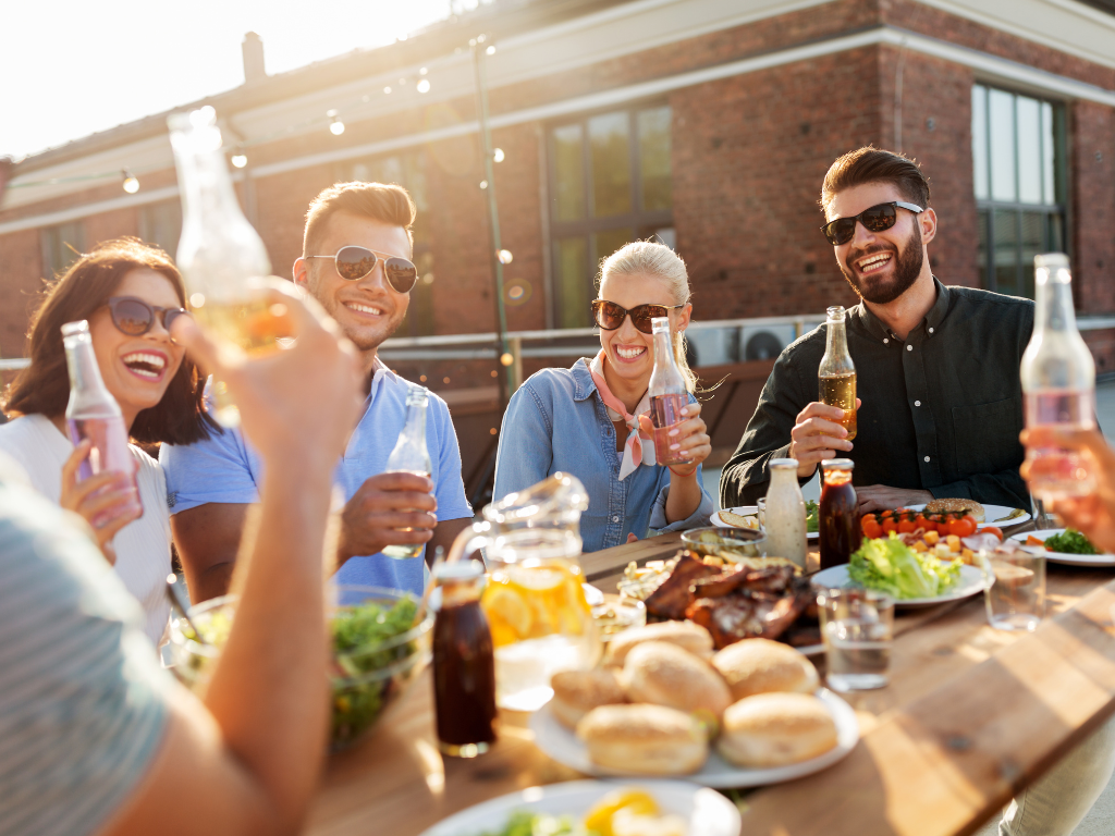 This is a picture of people who are gathered for a BBQ